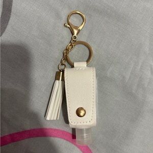 White Hand Sanitizer Keychain with Tassel and Gold Hardware